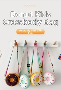 Group of four silicone donut-shaped kids' crossbody bags in vibrant colors with straps