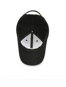 Detail of baseball cap interior showing neat stitching and gold metal buckle adjustment