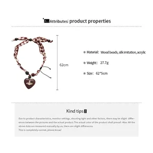 Size chart for heart pendant necklace with wood beads and red plaid silk ribbon details