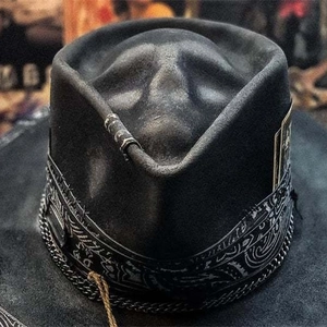 Black gothic wide-brim cowboy hat with metal chain and skull face embossing