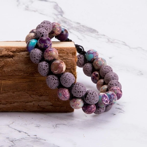Detail of 8mm double-layered woven bracelet with purple lava rock and emperor stone beads