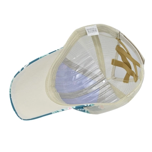 Detail of cross elastic bands for ponytail and tropical print under brim on white cap