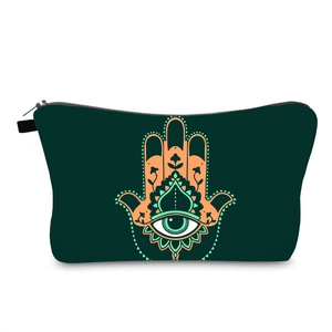 Waterproof dark green makeup bag featuring orange Hamsa hand and Evil Eye print