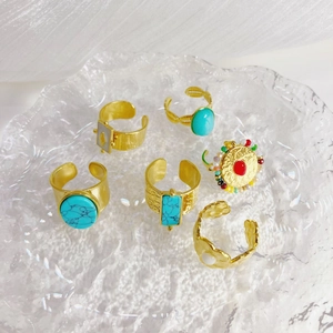 Set of six 14K gold stainless steel rings featuring turquoise, mother of pearl and beads