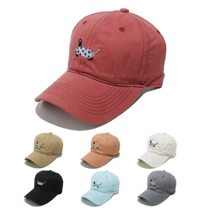 Detail of dachshund embroidery on cotton baseball caps in seven assorted colors