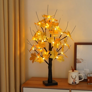 Cozy LED maple tree lamp with golden leaves and black trunk for holiday home decoration