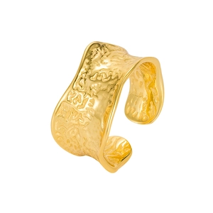 Irregular hammered gold open ring with a modern convex texture and glossy finish