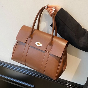 Brown leather large capacity tote bag with gold metal lock for women's daily commute