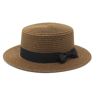 Classic dark brown flat top boater hat with black ribbon bow for summer beach sun protection