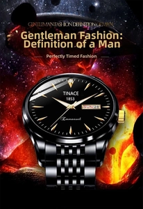 Detail view of black watch dial with gold markers, dual calendar, and stainless steel band