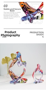 Close-up of colorful graffiti abstract thinker sculptures on a marble desktop