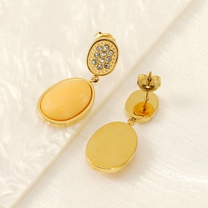 Vintage geometric gold-plated earrings with white zircons and yellow oval gemstones