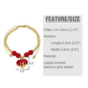 Detail view of gold beaded bracelet with red heart pendant and product dimensions