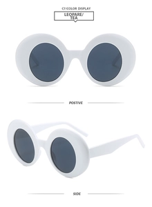 Front and side view of round frame oversized contrast white sunglasses with grey lenses