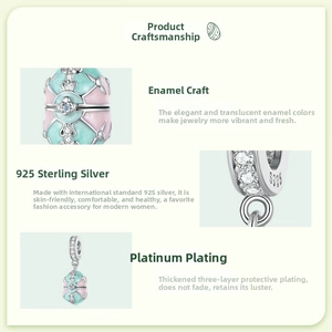 Detail of 925 sterling silver Easter egg charm with pink enamel and sparkling zircon