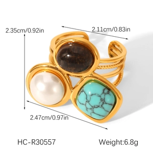 Detailed view of vintage gold ring with pearls, turquoise, and tiger eye with size specs