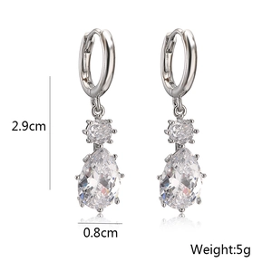 Macro shot of silver zircon drop earrings showing dimensions 2.9cm length and weight 5g