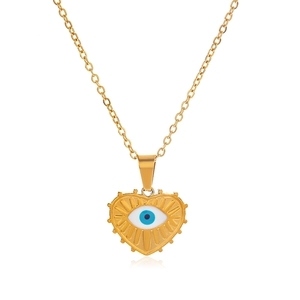 Golden heart necklace with blue evil eye pendant on a clean white background