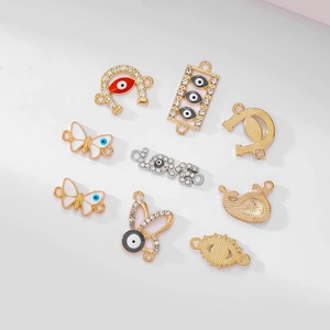 9pcs set of evil eye alloy pendants in shapes of horseshoe butterfly and rabbit for DIY jewelry