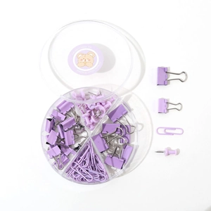 Pastel purple stationery set with binder clips and paper clips in a clear desktop organizer