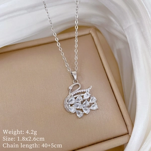 Macro view of crystal swan pendant with dimensions 1.8x2.6cm and chain specs