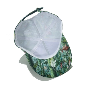 Detail view of the interior with forest camouflage print and adjustable metal buckle strap