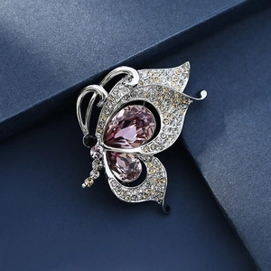 Elegant butterfly brooch with pink teardrop crystals and sparkling rhinestones