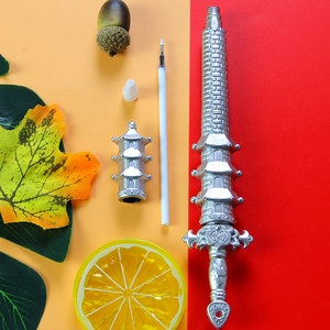 Silver pagoda sword gel pen stationery set with pen refill on decorative background