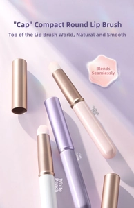 Detailed view of portable mini lip brushes in cherry pink, lilac, and peach colors