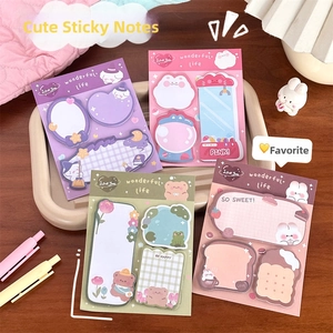 Detail of cute cartoon sticky notes in assorted colors like purple and pink for journaling