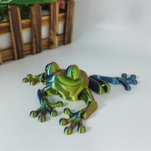 Macro detail of 3D printed articulated frog toy with metallic multicolor gradient finish