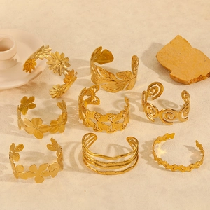 18k gold plated stainless steel open bangles with floral and leaf textured patterns