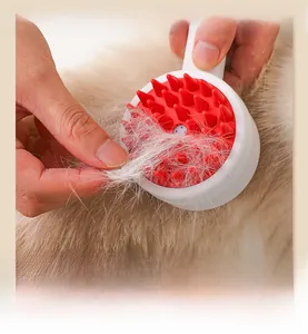 Detail showing red silicone bristles removing white loose fur from light brown pet hair
