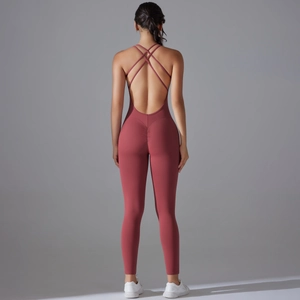 Dusty pink backless yoga bodysuit with scrunch butt lift and crisscross straps
