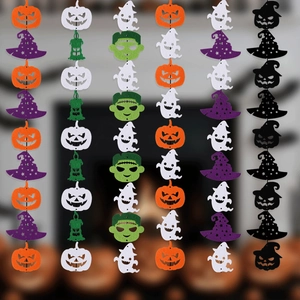 Close-up of Halloween felt banners featuring classic pumpkin, ghost and wizard hat icons