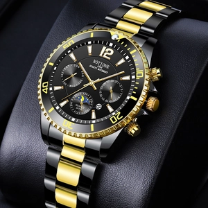 Close-up of NOTIONR quartz watch with dual-tone metal strap and multi-dial black display