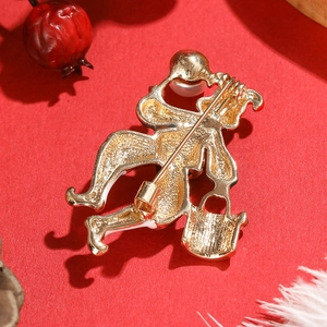 Christmas cartoon clown brooch in gold metal with enamel and pearl accents back view