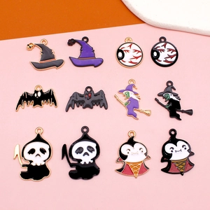 Various Halloween alloy pendants featuring witch, skull, and pumpkin motifs on orange background