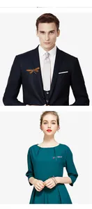 Detailed model show of colorful dragonfly brooches on suit lapel and dress