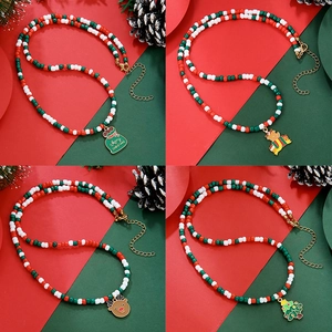 Christmas beaded necklace set with Santa, reindeer and tree charms in red, white and green