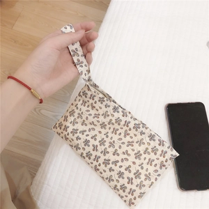 Floral canvas wristlet pouch with zipper for phone and cosmetics storage