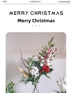 Close-up of artificial Christmas berries and frosted pine branches for festive floral decor
