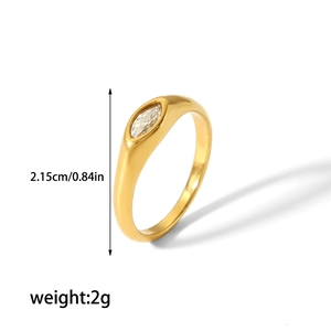 Detailed view of an 18K gold stainless steel ring with a marquise-cut crystal