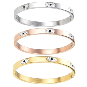 Fashionable evil eye bangle set in gold, rose gold and silver stainless steel finishes