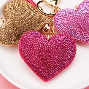 Creative heart shaped rhinestone keychain set in dark pink and gold with fashion tassels