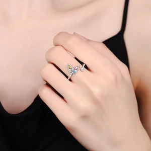 Minimalist silver butterfly open ring with colorful zircon stones on model hand