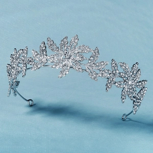 Elegant silver leaf-shaped bridal crown with sparkling rhinestones for parties
