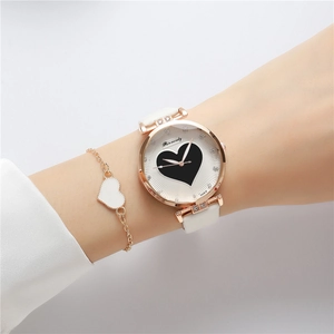Elegant white leather watch with rose gold heart dial and matching heart bracelet set