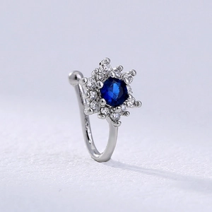 Silver flower nose cuff with blue gemstone and clear crystals, non-piercing design