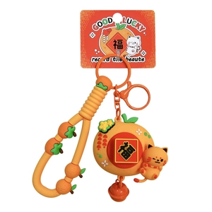 Cute lucky cat keychain with rotating Fu character and orange-themed silicone lanyard